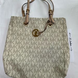 Michael Kors Cream Tote with Monogram Pattern and Gold Charm